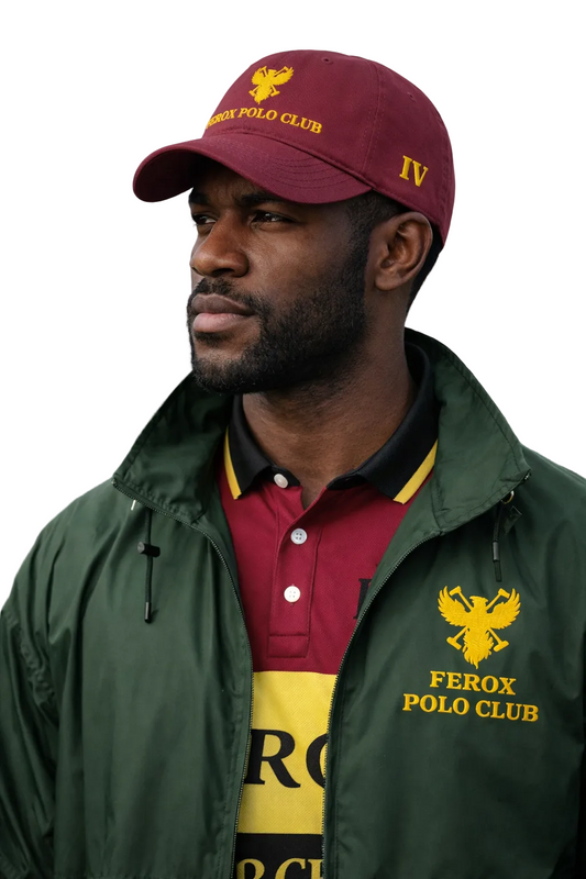 Man wearing a maroon cap and green jacket with Ferox Polo Club branding.