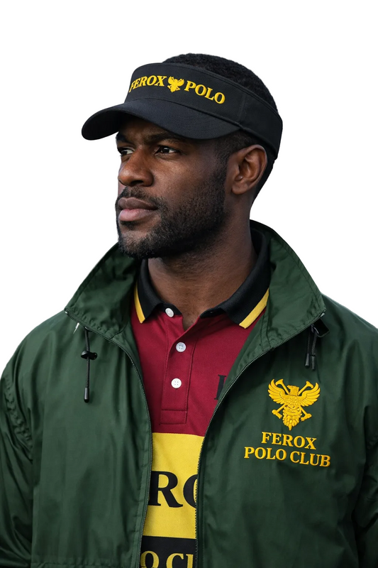 Man wearing a green jacket, red shirt, and black cap with 'Ferox Polo Club' branding.