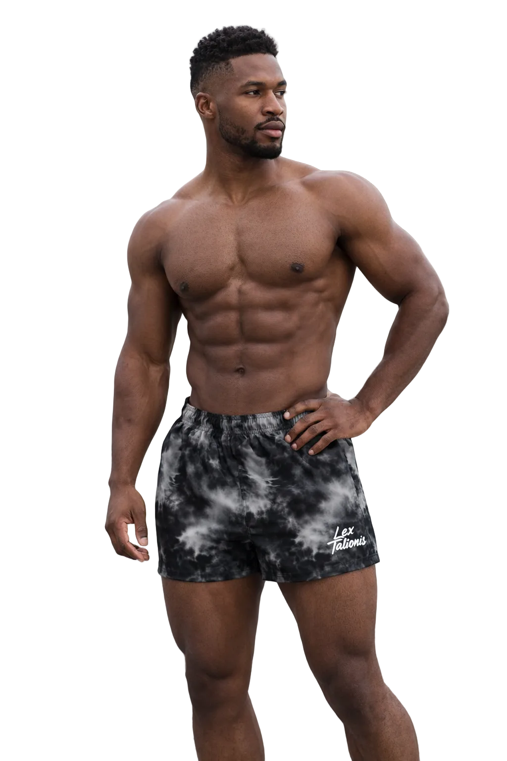 Man wearing black and gray tie-dye shorts on a bridge