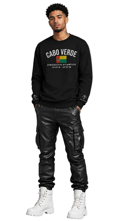 Person wearing a black sweatshirt with 'Cabo Verde' text and black leather pants on a gray background
