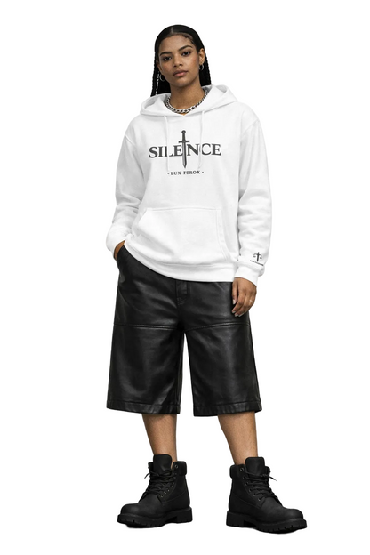 Person wearing a white hoodie with 'SILENCE' text, black leather shorts, and black boots on a light gray background