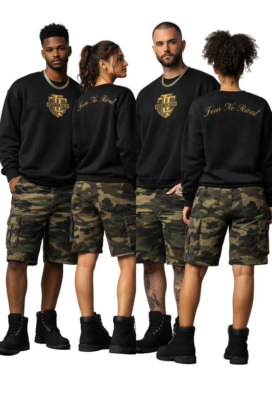 Four people wearing black sweatshirts with logos and camouflage shorts on a gray background