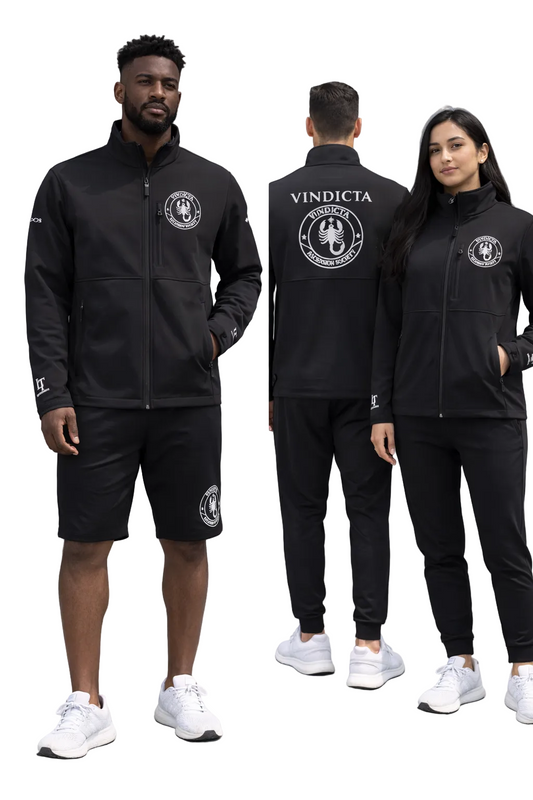 Two people wearing black tracksuits with a visible brand logo, standing in front of a gray building.