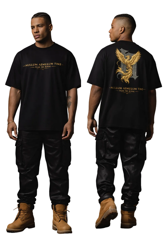 Person wearing a black t-shirt with gold text and a gold eagle emblem on the back, standing against a dark background.