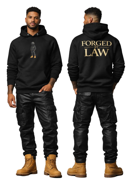 Black hoodie with 'Forged by the Law' text on the back, worn by a person against a gray background.
