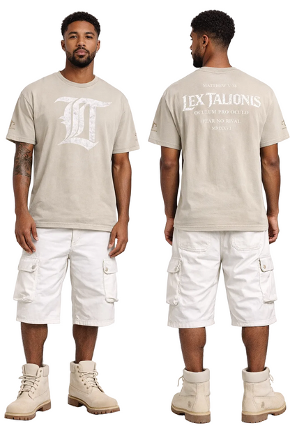 Man wearing a beige t-shirt with a logo and white cargo shorts on a white background