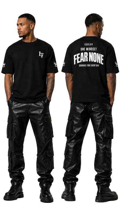 A male model shown from the front and back wearing a black short-sleeve graphic T-shirt and black leather-look cargo pants against a plain light gray studio background.