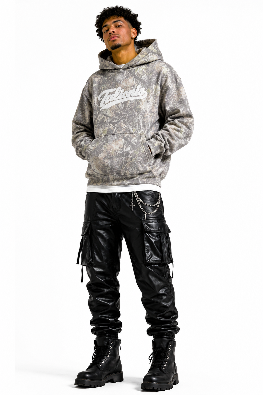 Person wearing a gray hoodie with a logo and black cargo pants on a white background