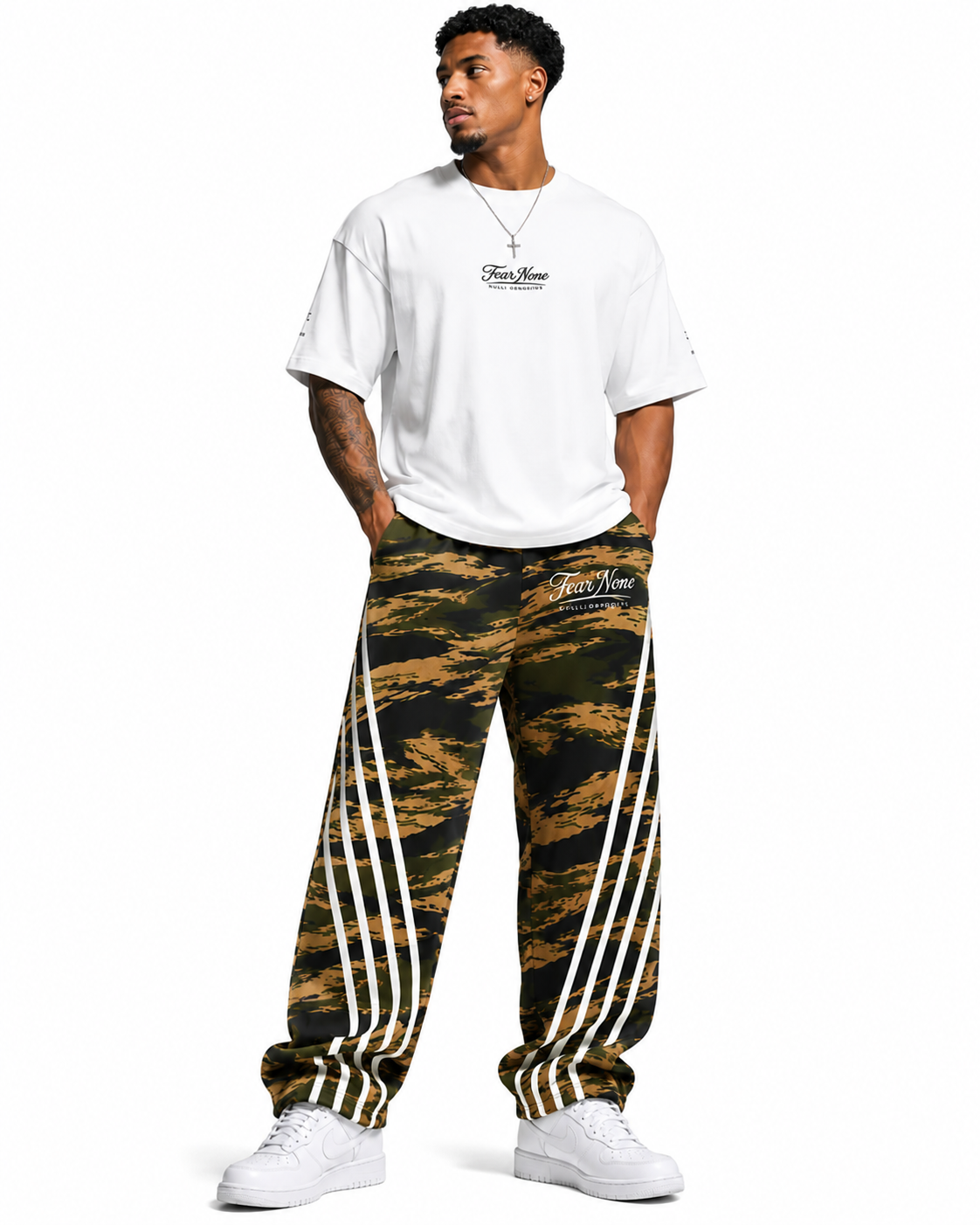 Person wearing a white t-shirt and camouflage pants with stripes on a white background